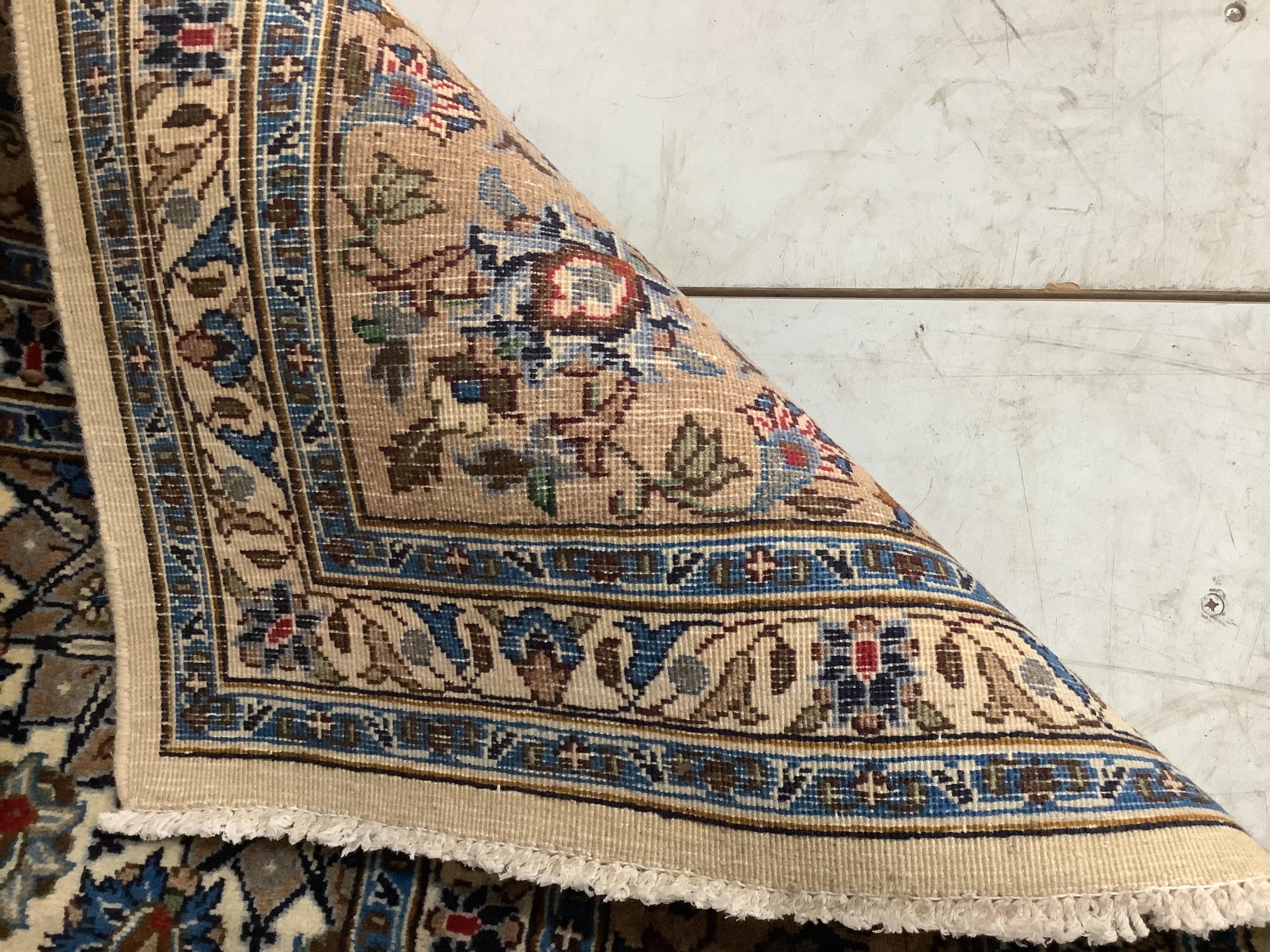 A Meshed ivory ground carpet, 294 x 196cm